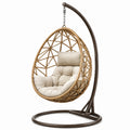 Sedia a dondolo sospesa in rattan con struttura in metallo e cuscino beige