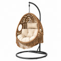 Sedia sospesa in rattan con cuscino beige e base in metallo nero, 200 cm